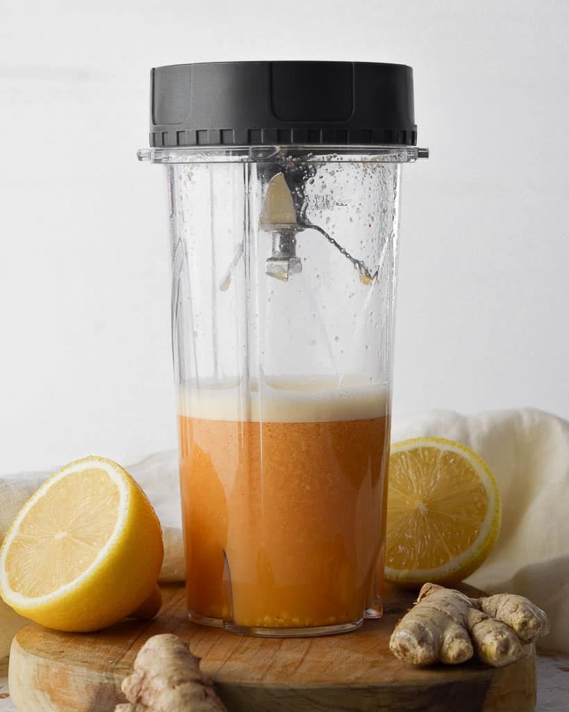 Blended lemon ginger cayenne shot liquid in the blender