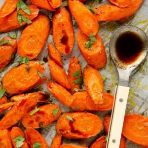 Featured image of roasted carrots on a baking tray.