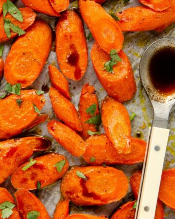 Featured image of roasted carrots on a baking tray.