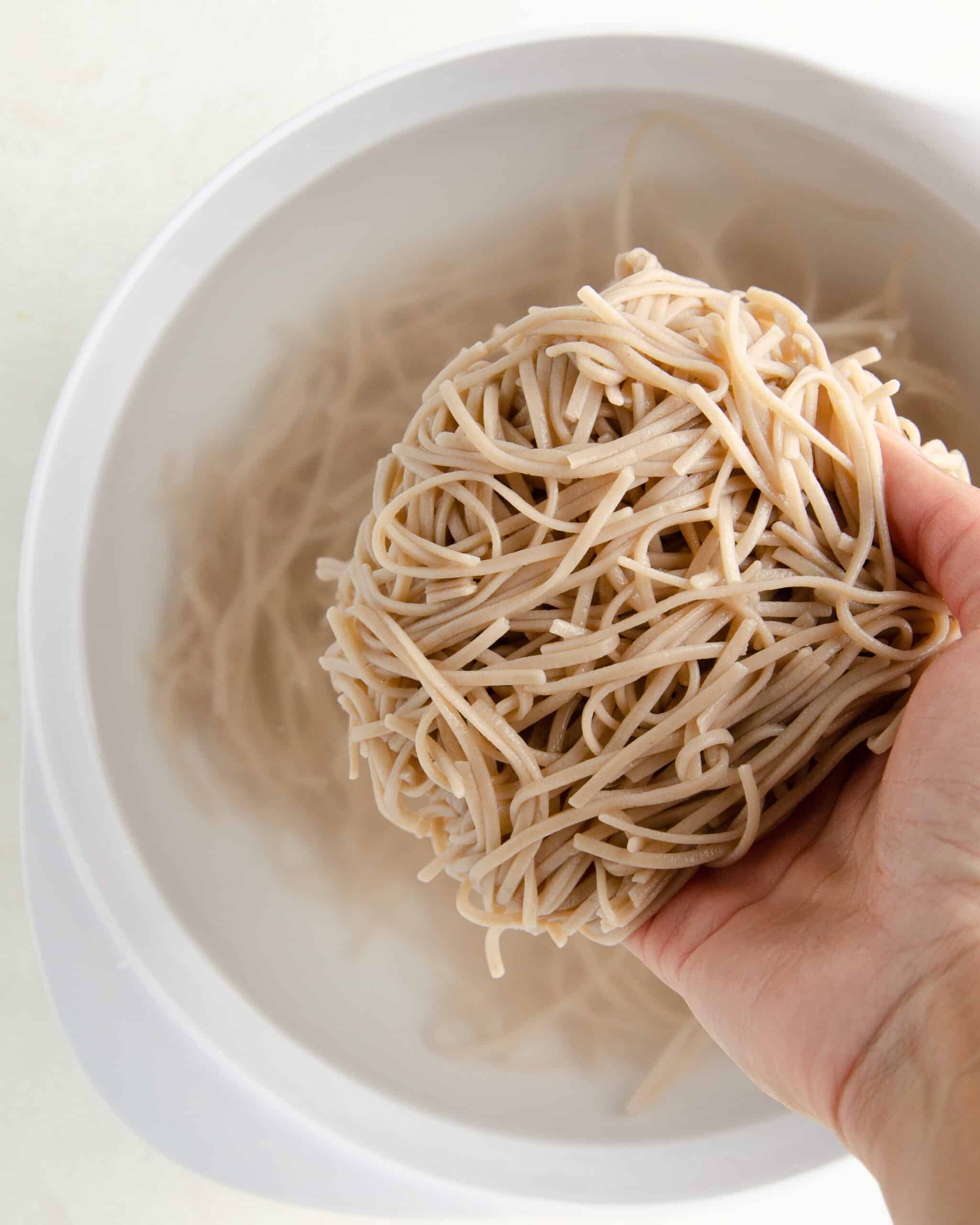 cooked soba noodles in a white bowl