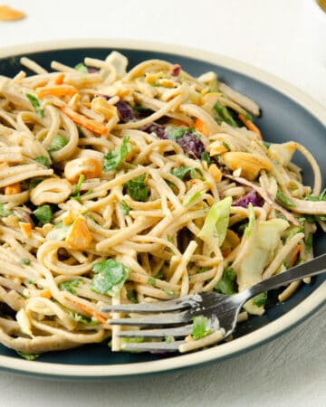bowl of cold soba noodle salad with spicy cashew dressing