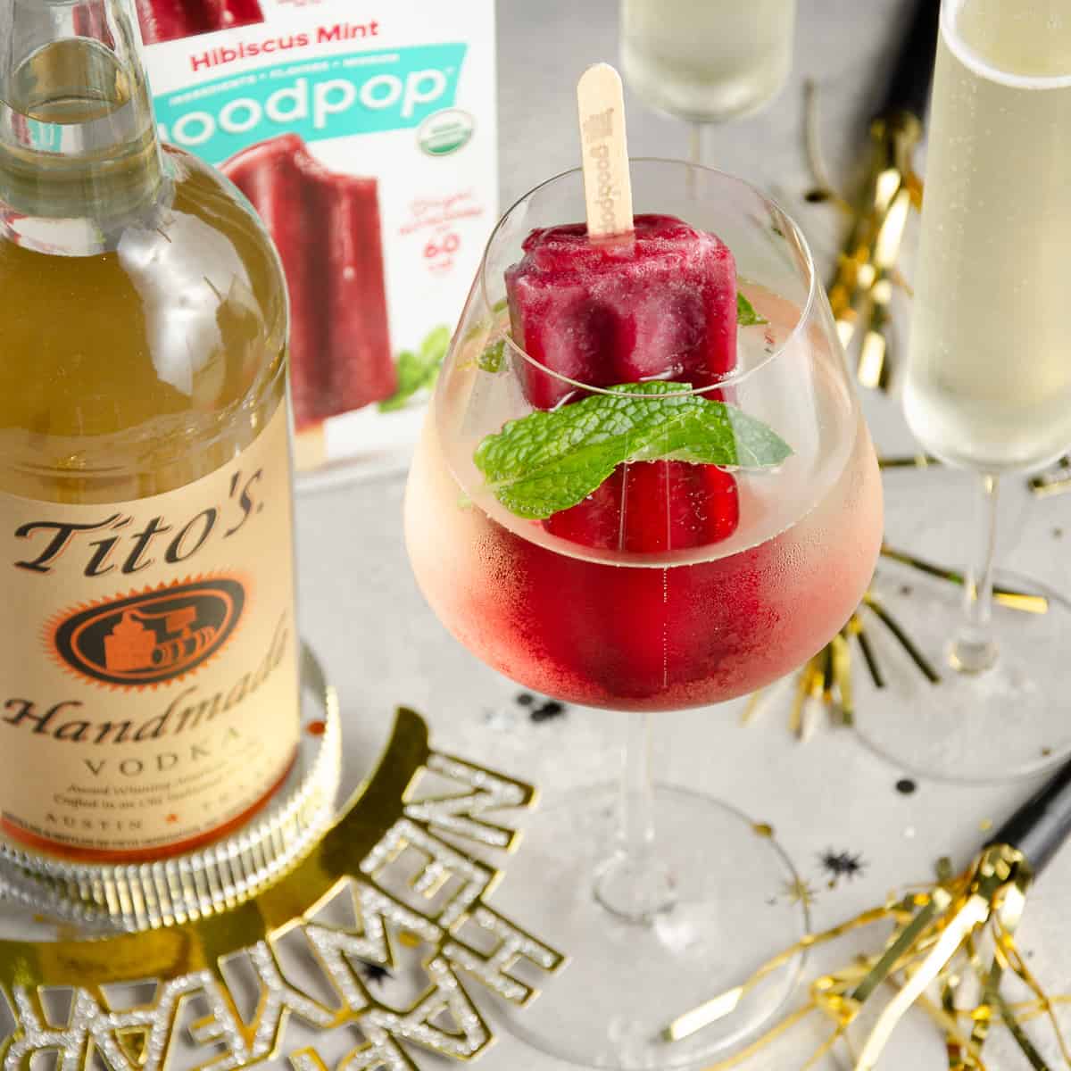 https://elisetriestocook.com/wp-content/uploads/2022/01/Hibiscus-Vodka-Cocktail-Featured-Image.jpg