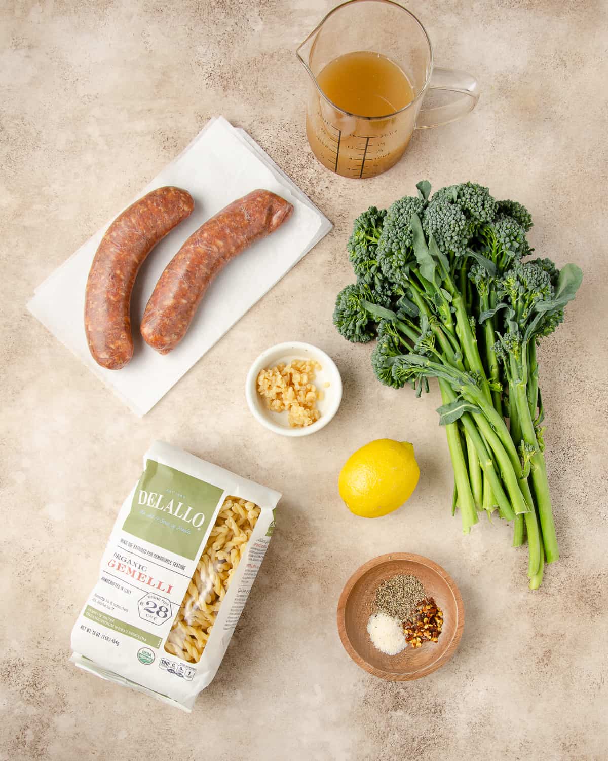 Ingredients needed for sausage and broccolini pasta. 