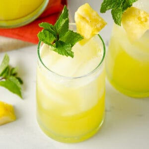 A featured image of a glass of pineapple agua fresca.
