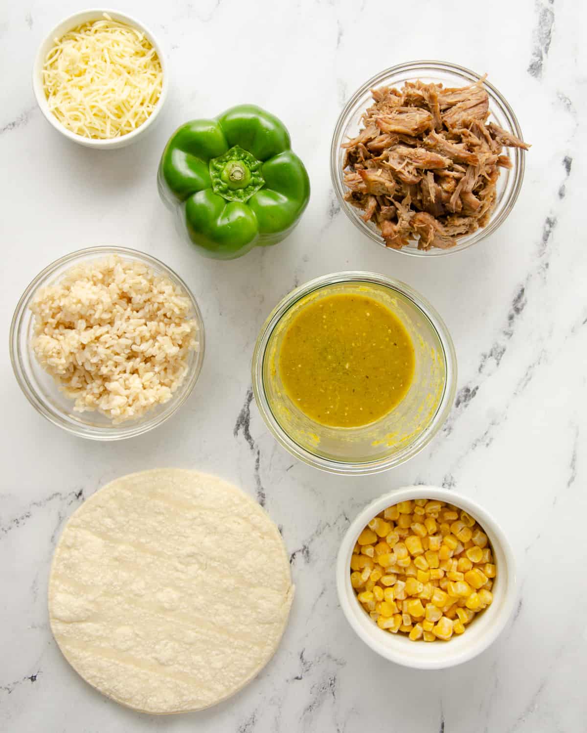Ingredients needed for carnitas enchiladas.