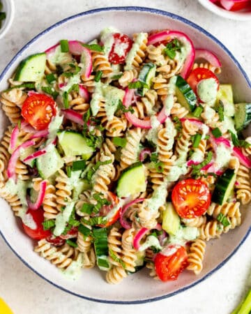 salad with protein,protein-packed salad,greek pasta salad,how to make pickled cherry tomatoes,how to quick pickle red onions,how to store a pasta salad