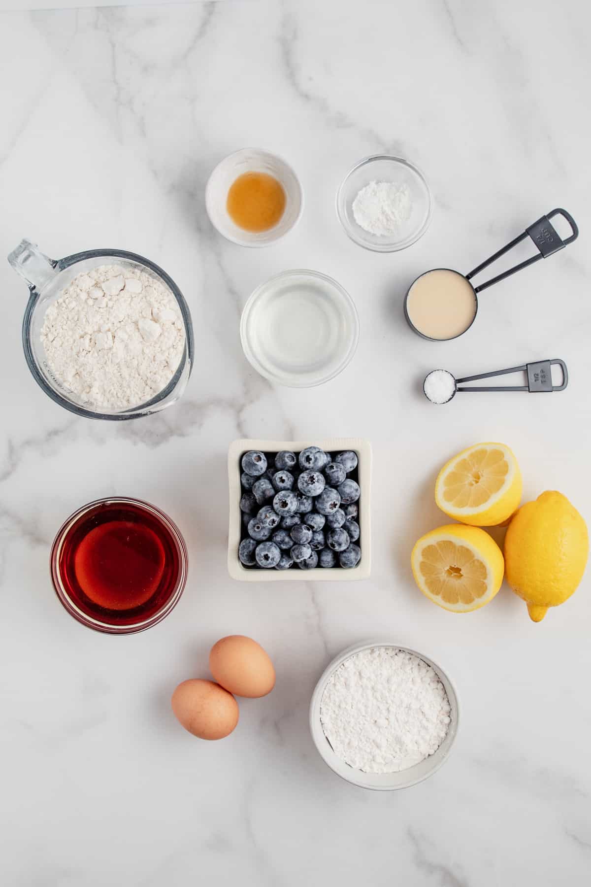 Ingredients needed for lemon blueberry bread.