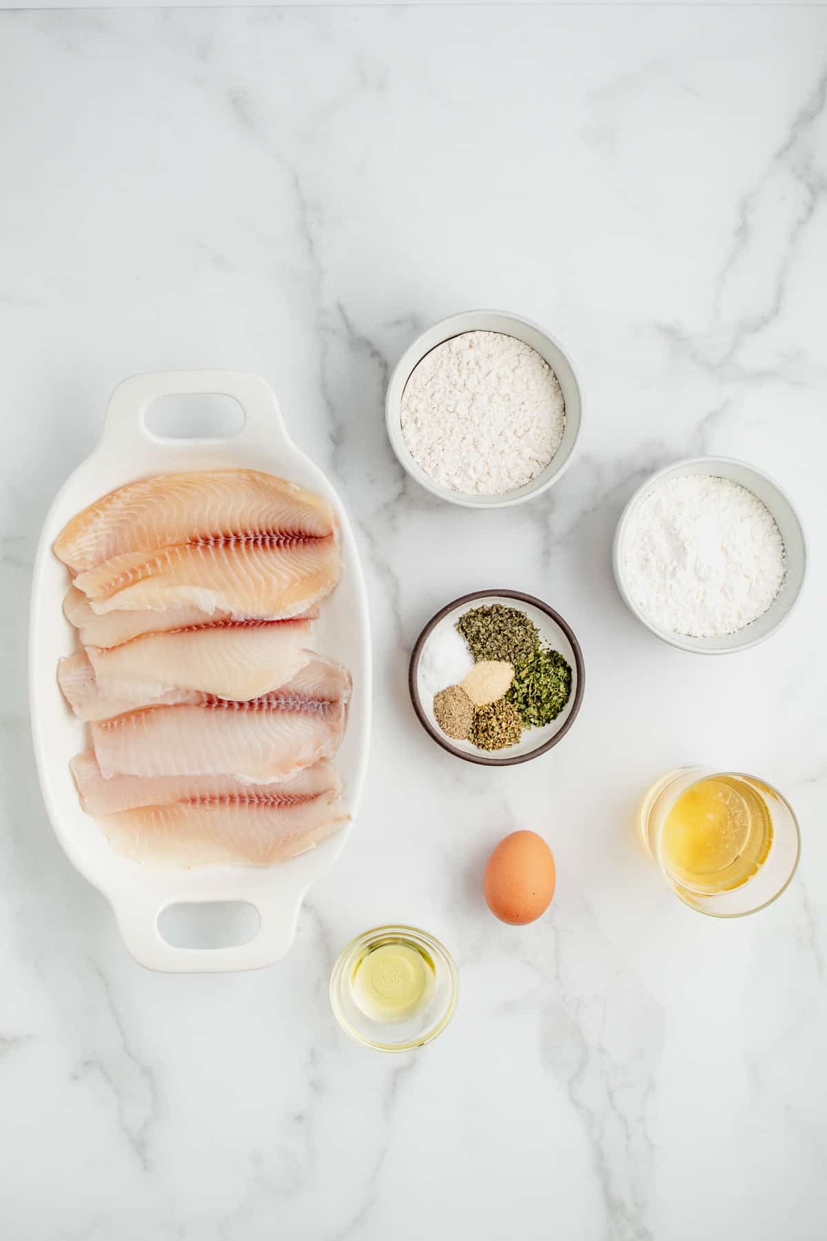 Ingredients needed to make gluten free breaded fish.