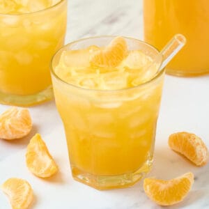 Featured image of mandarin juice in a glass.