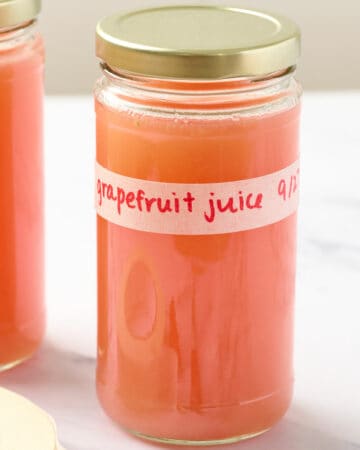 Preparing grapefruit juice for the fridge featured image.