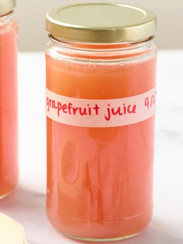 Preparing grapefruit juice for the fridge featured image.