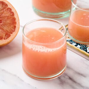 Fresh squeezed grapefruit juice in a glass.