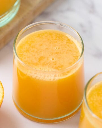 Freshly squeezed orange juice in a glass.