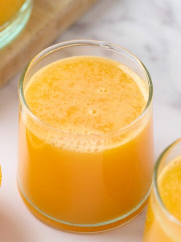 Freshly squeezed orange juice in a glass.