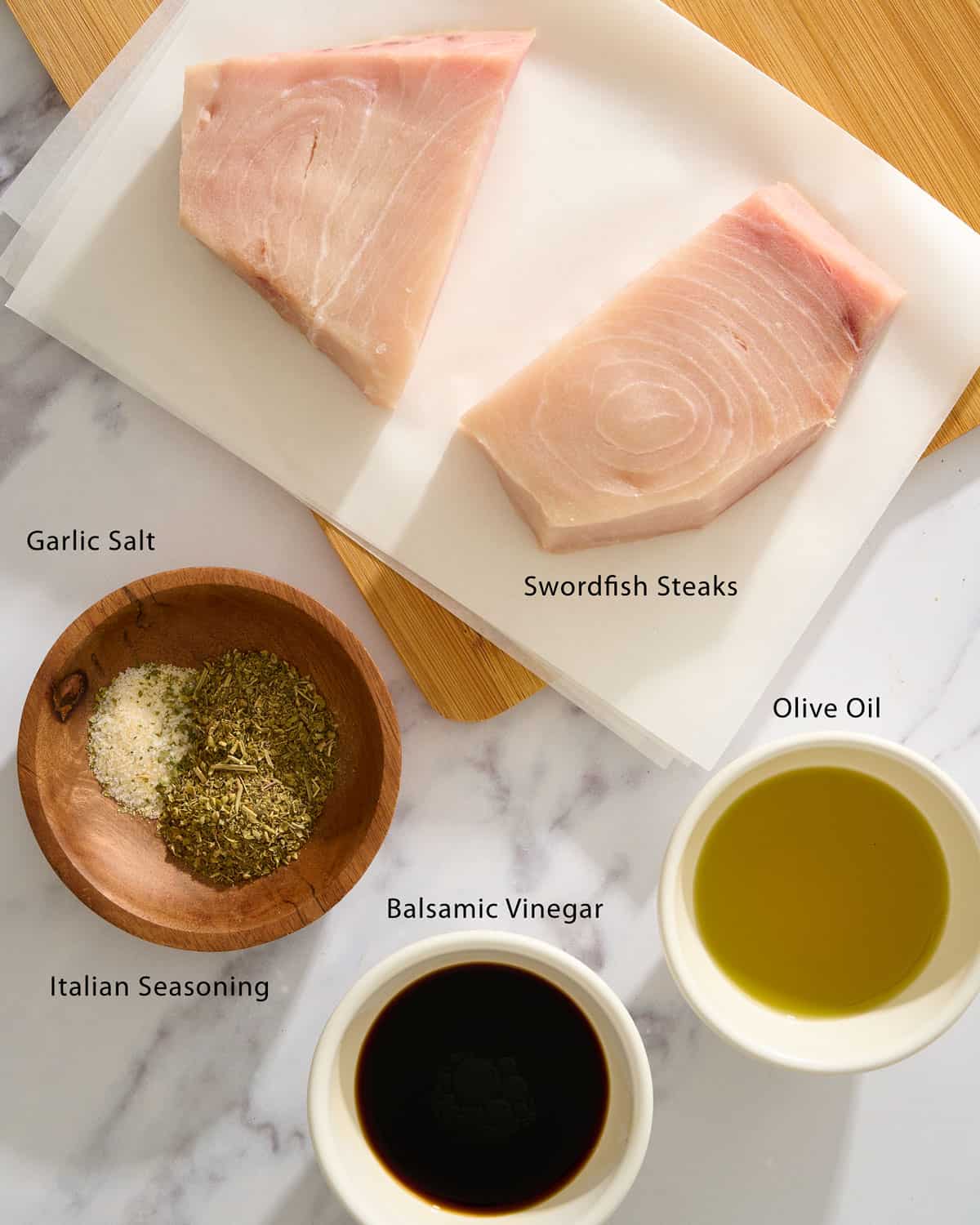 Ingredients needed to make balsamic baked swordfish.