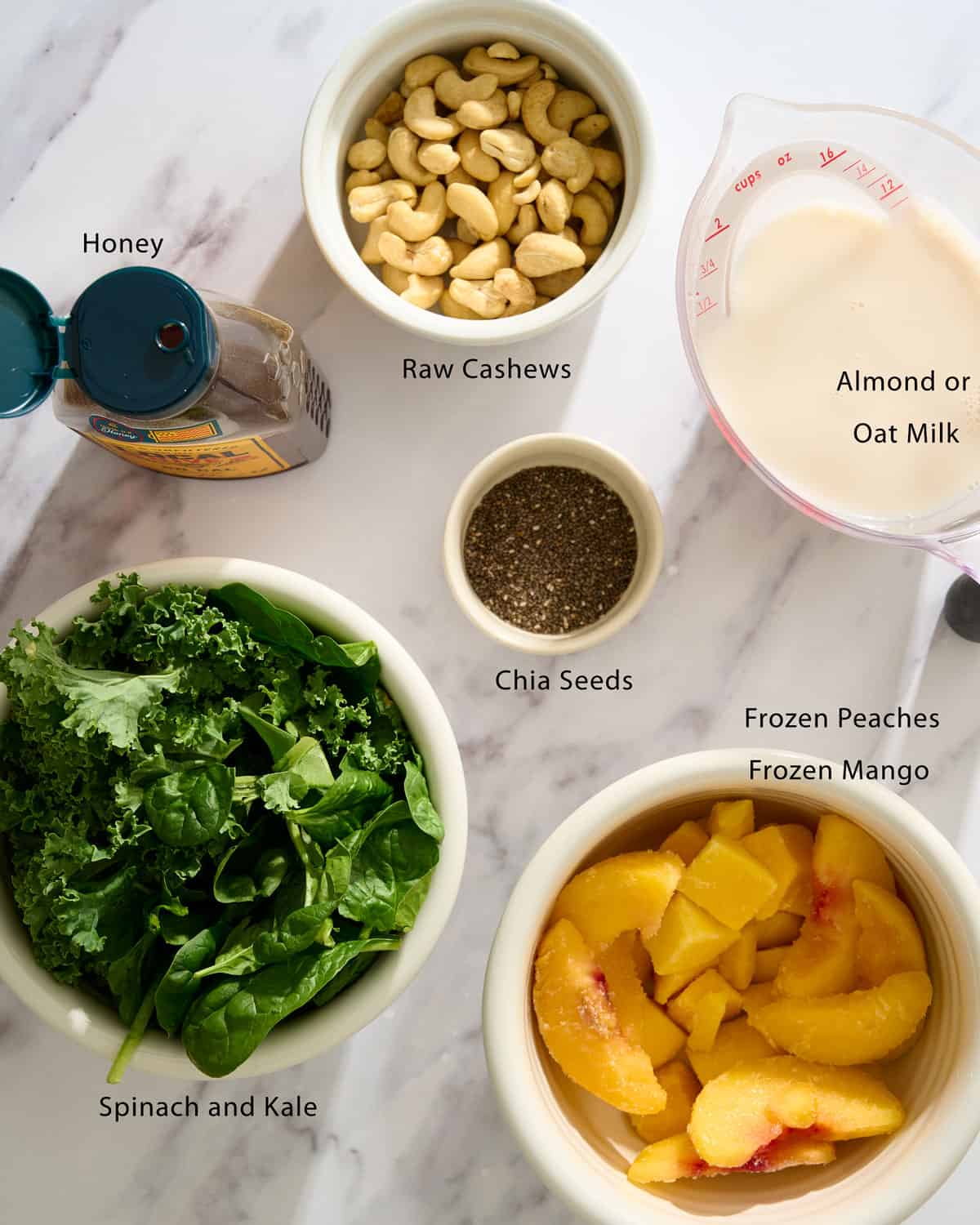 Ingredients needed to make kale and spinach smoothies.